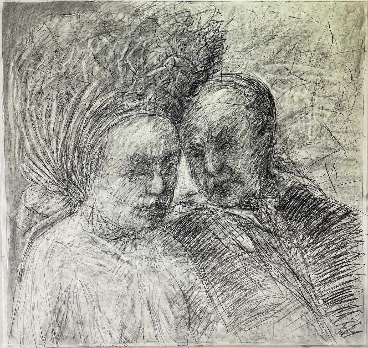 Lovers: a large charcoal drawing of two heads leaning together, built from dense scribbled marks
